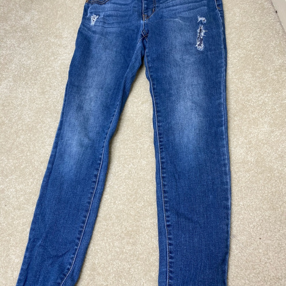 Blue jeans with rips